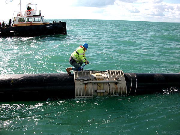 2 Tugs and a Giant Pipe...read more